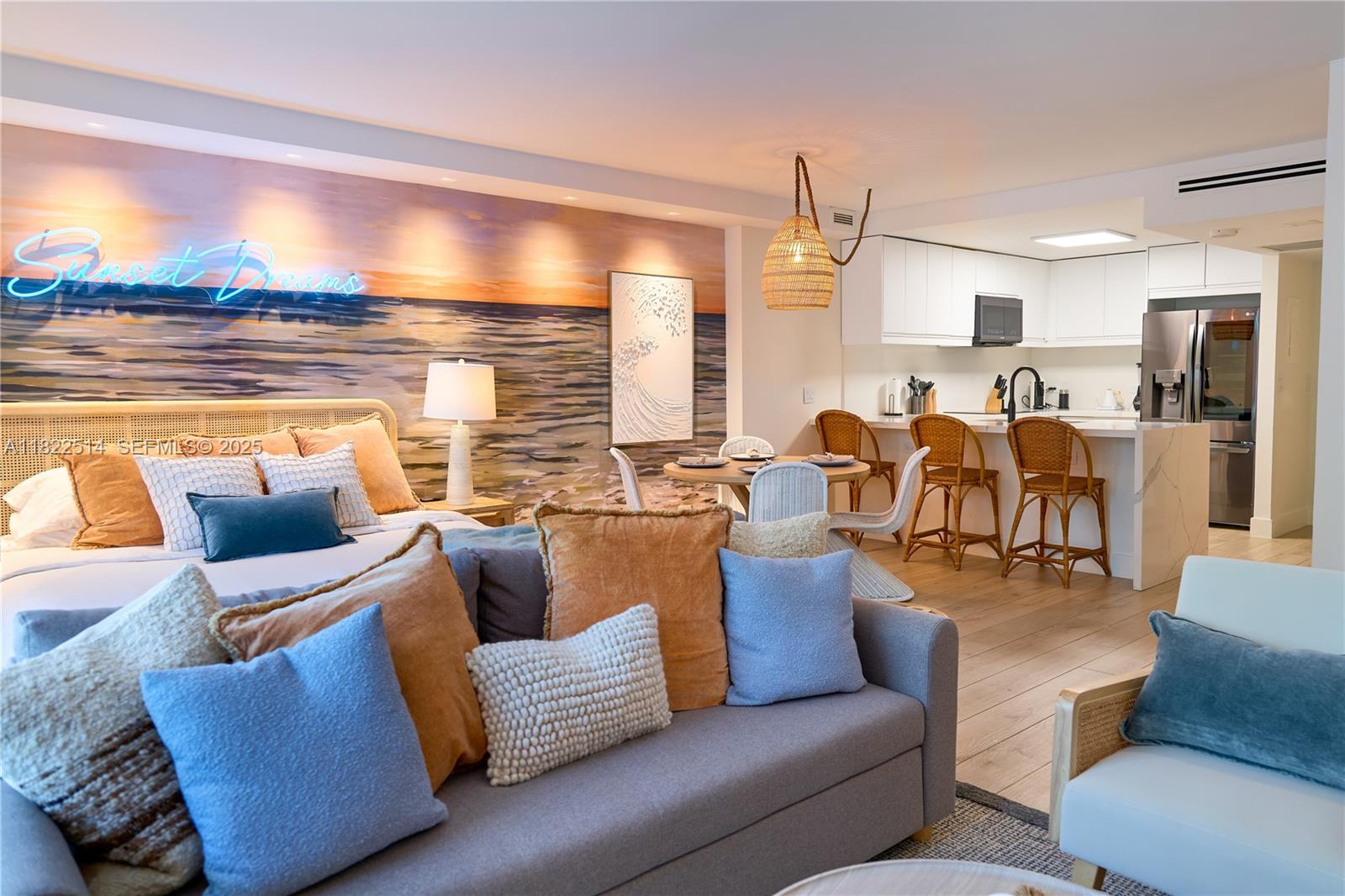 2301 Collins Avenue, Unit 329 Miami Beach, FL 33139 - Photo 9 of 47 a living room with furniture and a large window