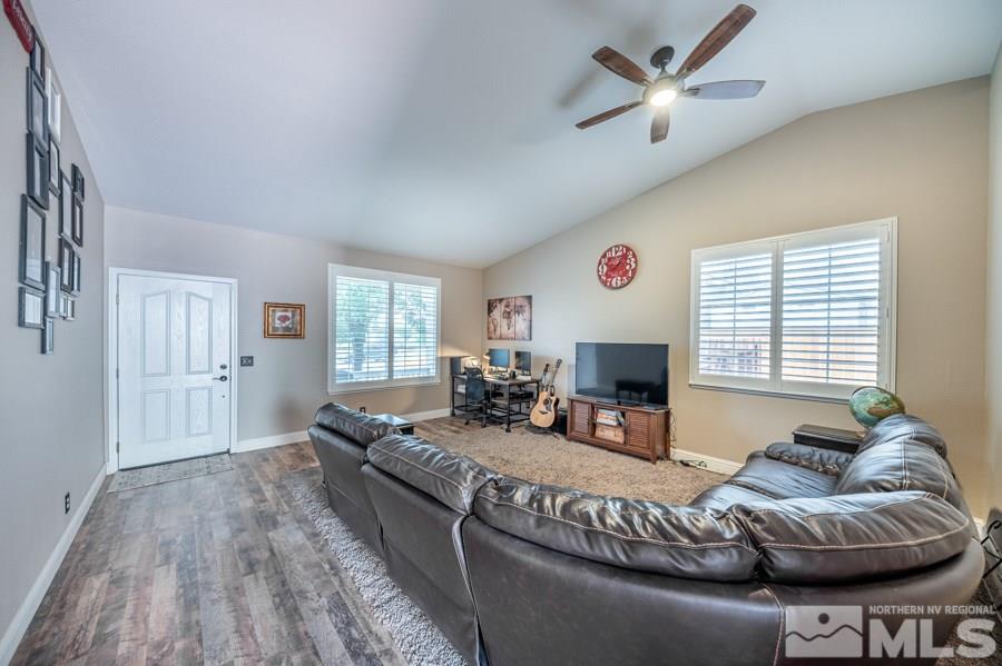1490 Rainbow Ridge Road Reno, NV 89523 - Photo 9 of 33 a living room with fireplace furniture and a large window