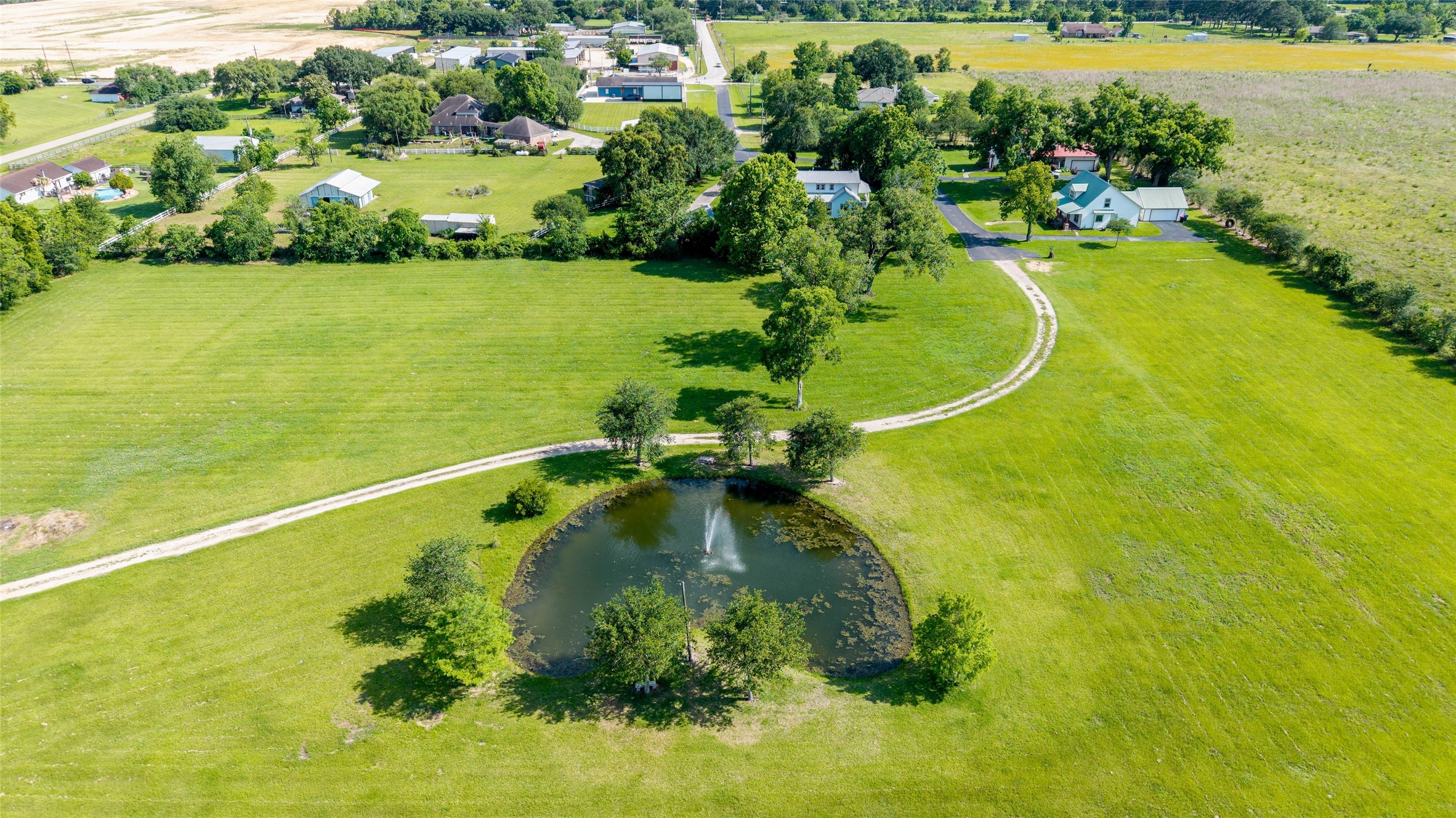 26631 Decker Prairie-Rosehill Road Magnolia, TX 77355 - Photo 14 of 20 a view of a lake with a houses
