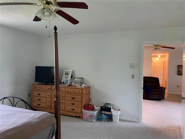 a room with a door and mirror