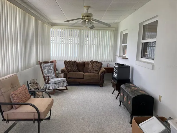 a view of a swimming pool with a yard