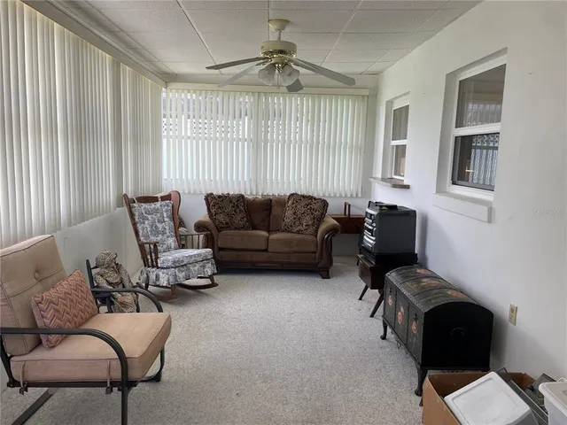 a view of a swimming pool with a yard