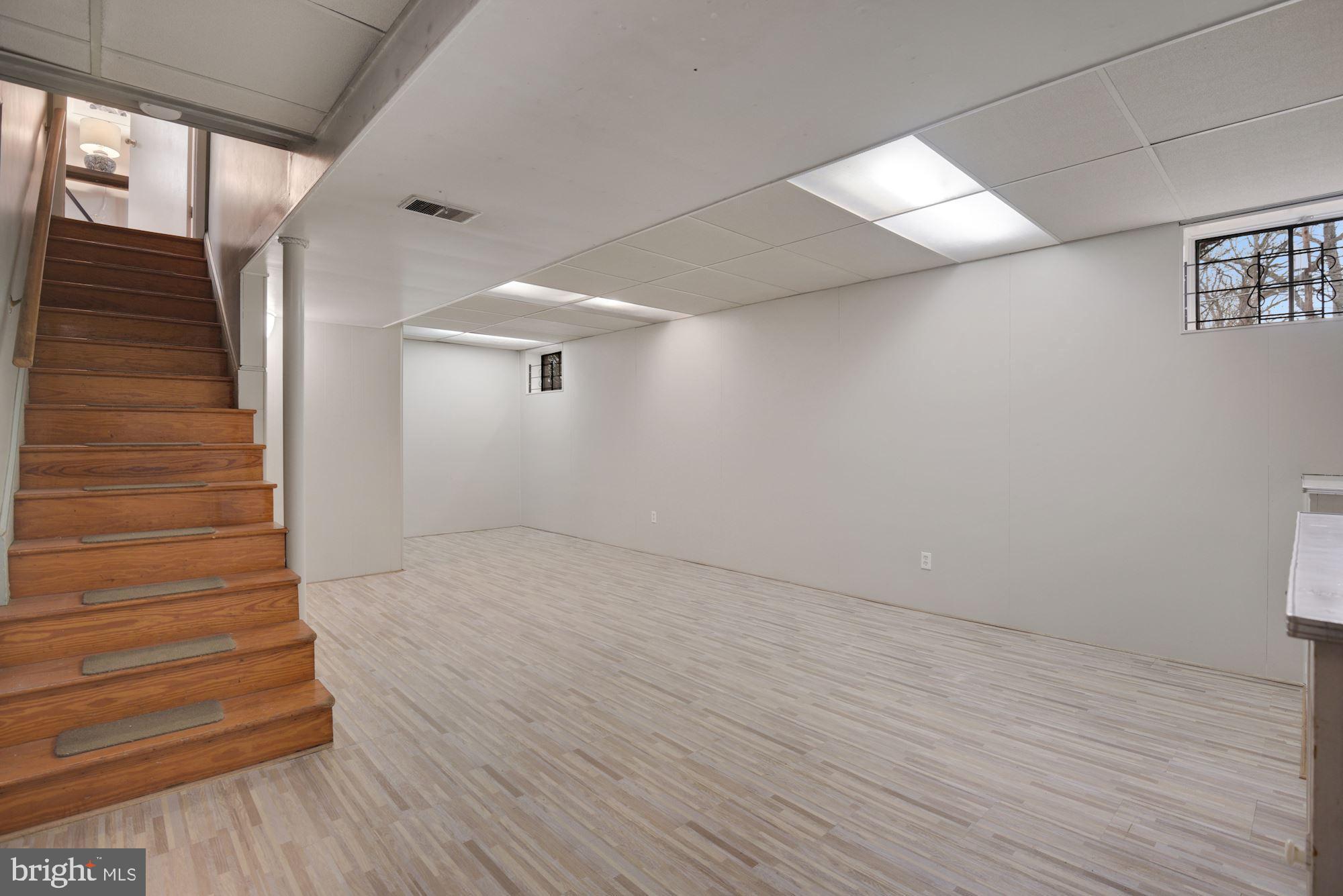 2916 Wilton Avenue Silver Spring, MD 20910 - Photo 22 of 45 LARGE RECREATION ROOM FRESHLY PAINTED & NEW FLOOR