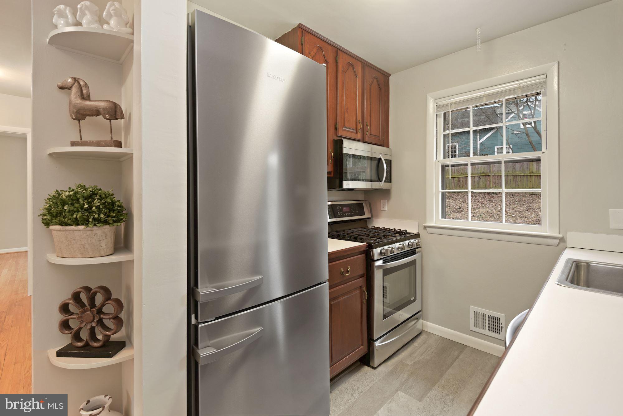 2916 Wilton Avenue Silver Spring, MD 20910 - Photo 8 of 45 GALLEY KITCHEN WITH UPDATED APPLIANCES & FLOORING