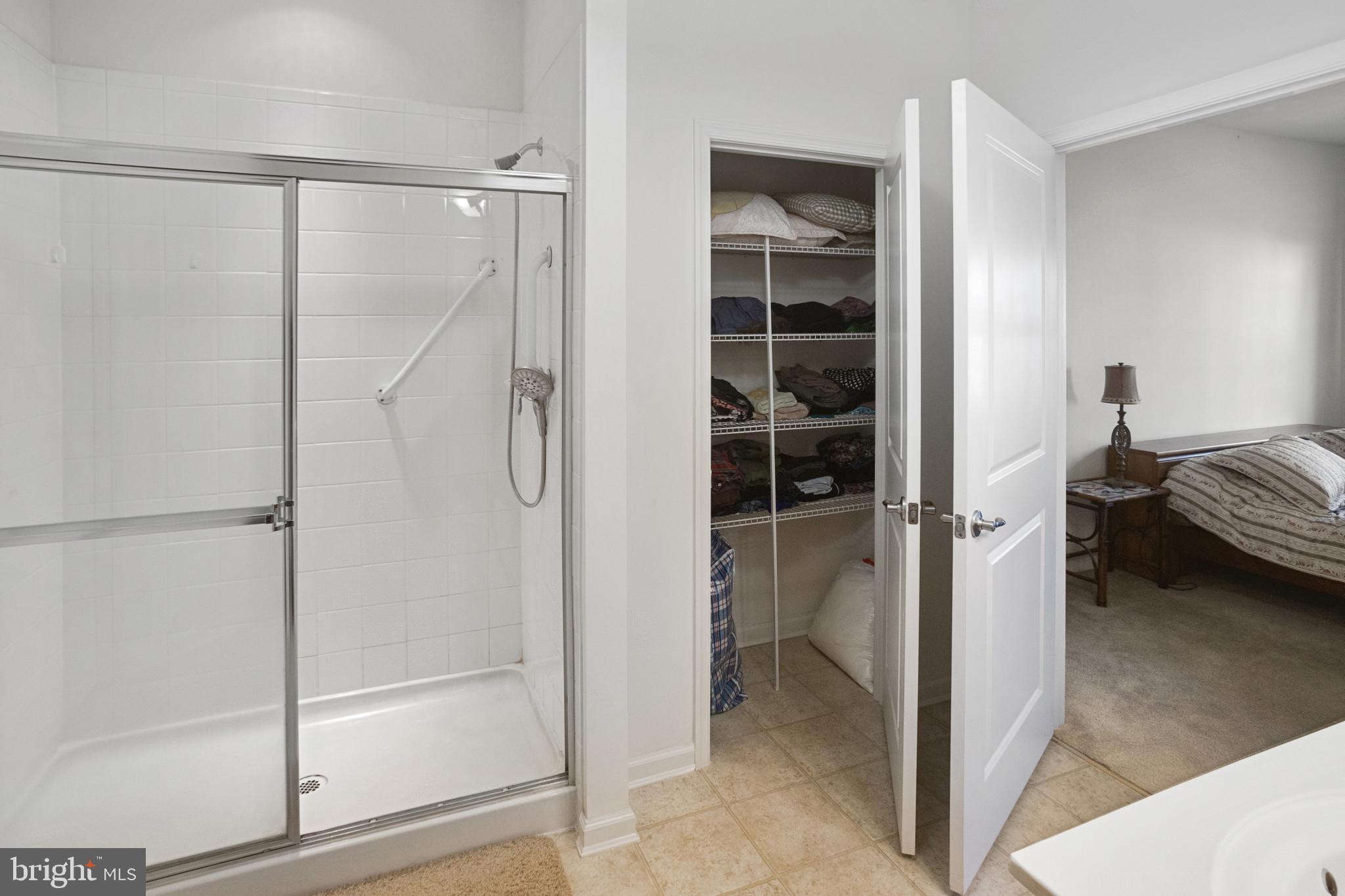 143 Bobbys Branch Road, Unit 19 Millsboro, DE 19966 - Photo 23 of 43 Owner's Suite Shower & Linen Closet