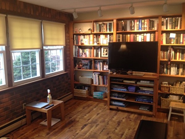 80 Carpenter Road Northbridge, MA 01588 - Photo 10 of 17 a living room with furniture and a flat screen tv