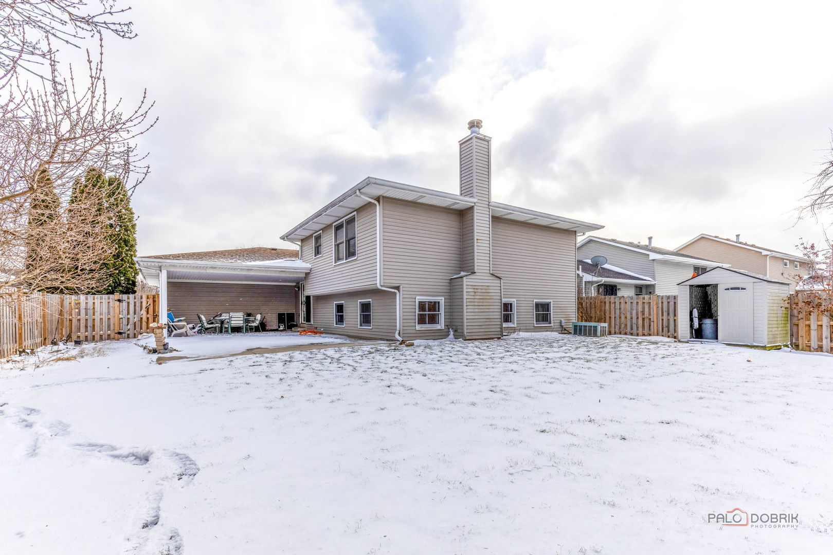 1716 Red Bud Road Bolingbrook, IL 60490 - Photo 34 of 38 a front view of a house with a yard