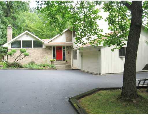 Exterior Front. Great Curb Appeal and extremely Private.