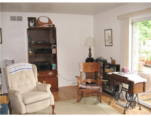 Family Room. "Homey" Room with Sliding Glass Door to Deck, Hot Tub and Back Yard. Engineered Hard Wood Floor.