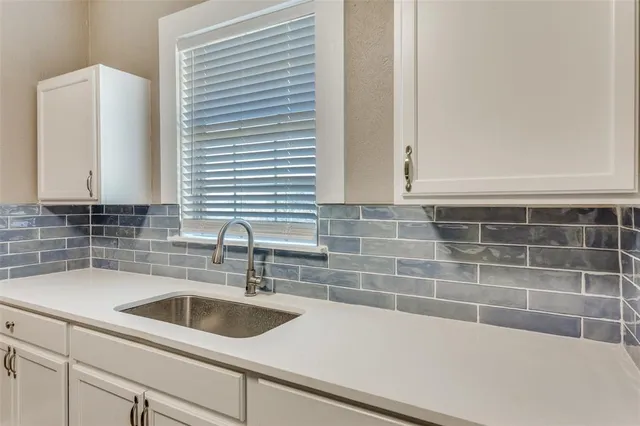 a bathroom with a sink and a bathtub