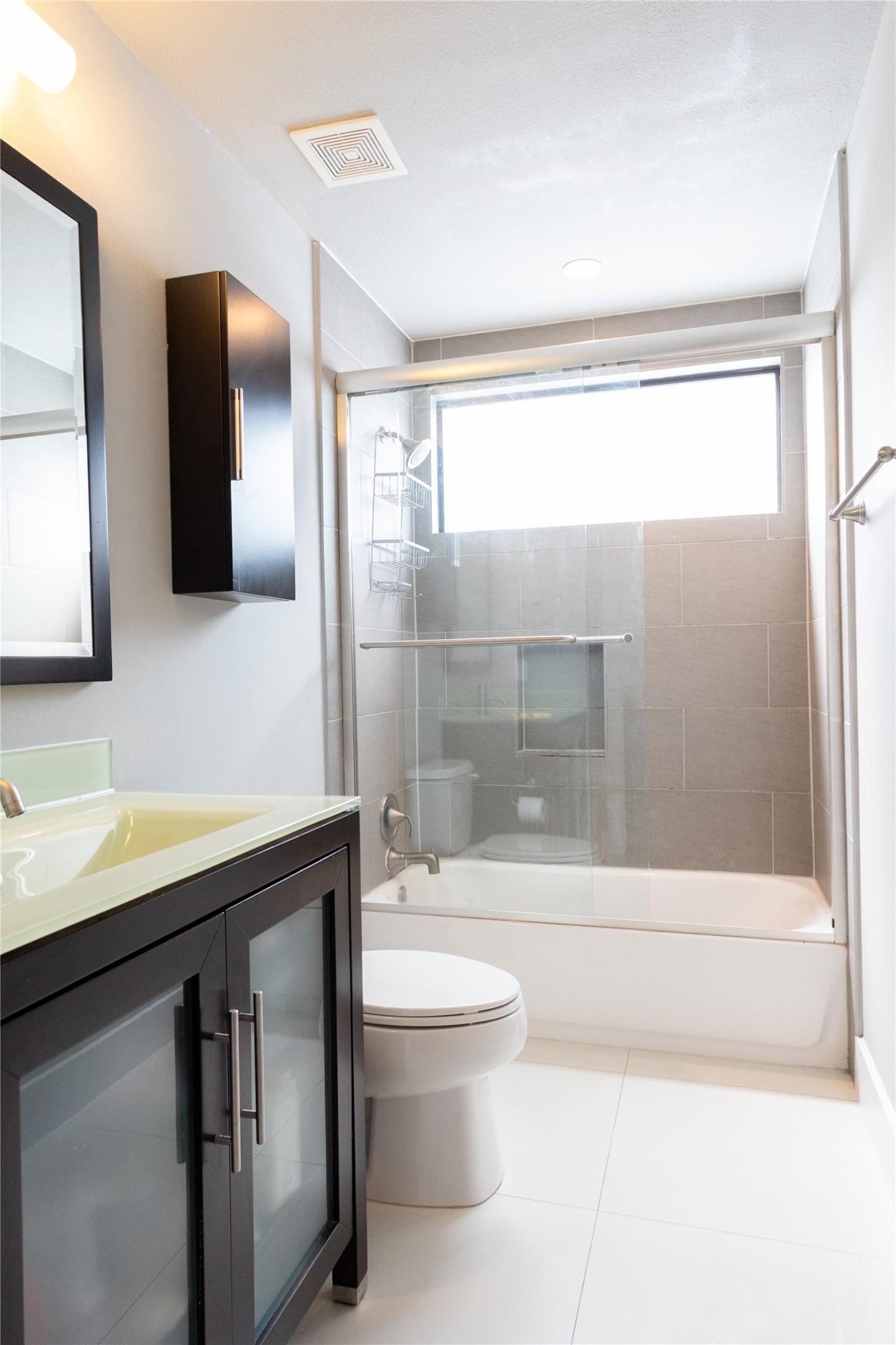 3000 Speedway, Unit C Austin, TX 78705 - Photo 12 of 20 a bathroom with a sink a toilet and shower