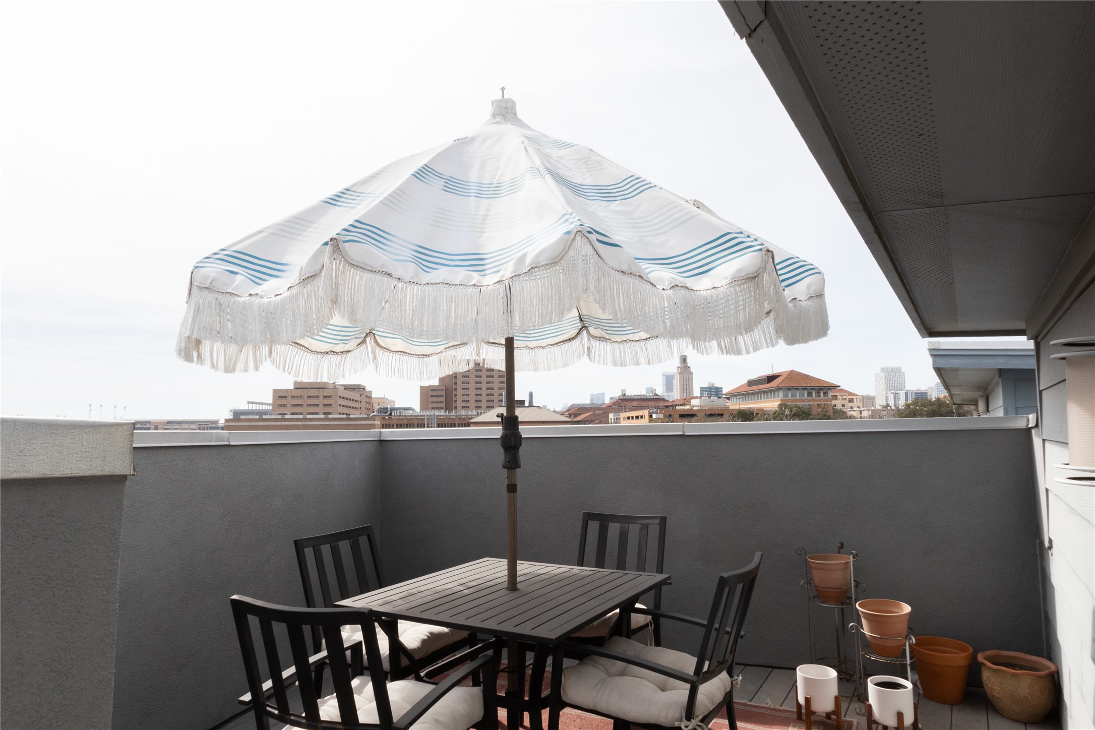 3000 Speedway, Unit C Austin, TX 78705 - Photo 19 of 20 a view of a dining room with furniture and chandelier