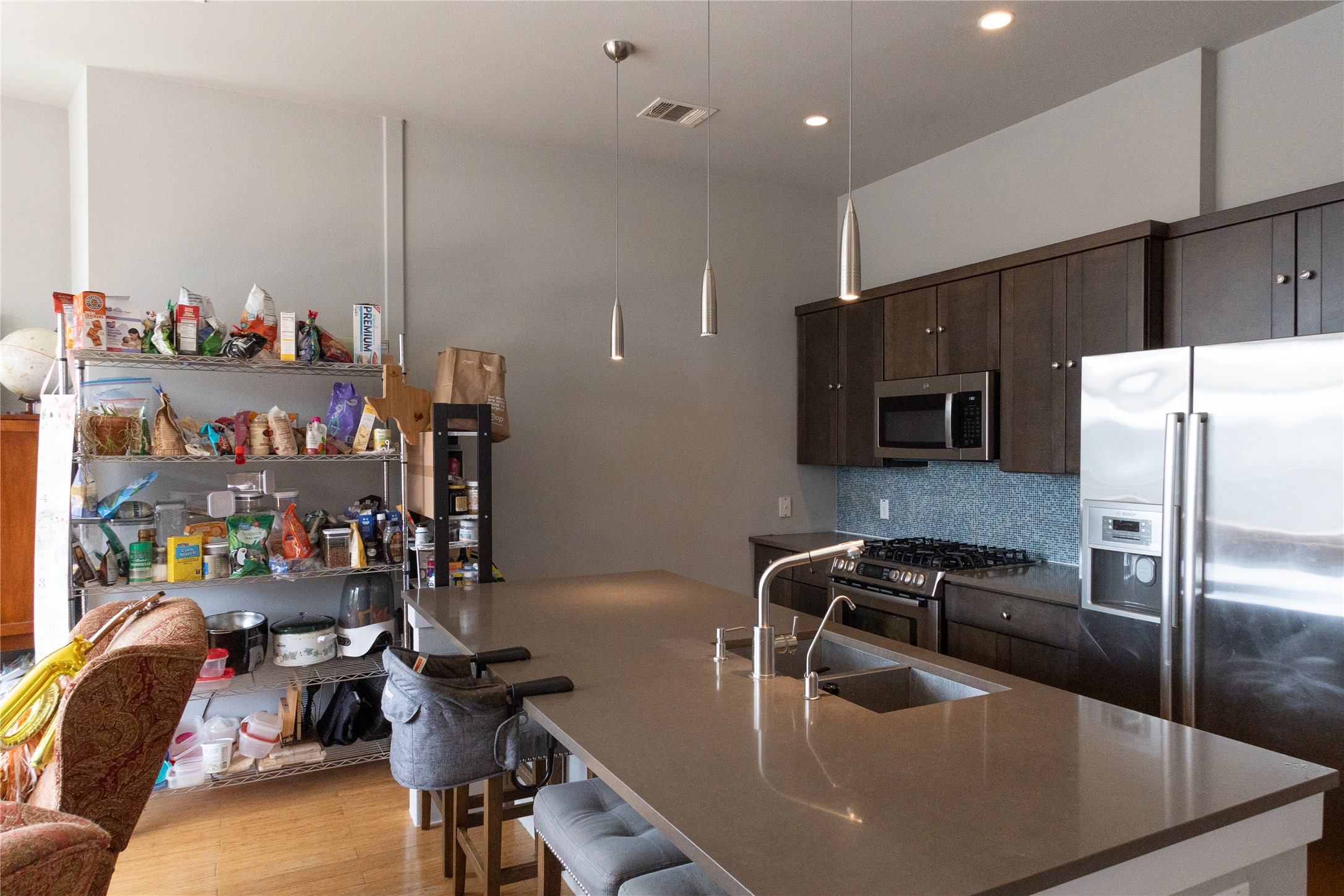 3000 Speedway, Unit C Austin, TX 78705 - Photo 8 of 20 a kitchen with kitchen island a sink appliances and cabinets
