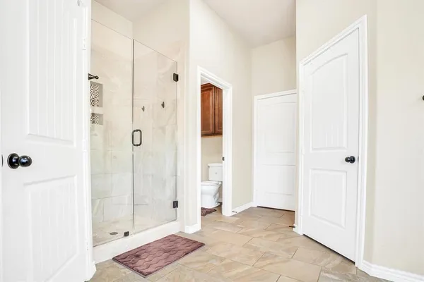 a view of a bathroom with a shower