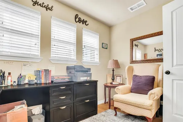 a living room with furniture and a window