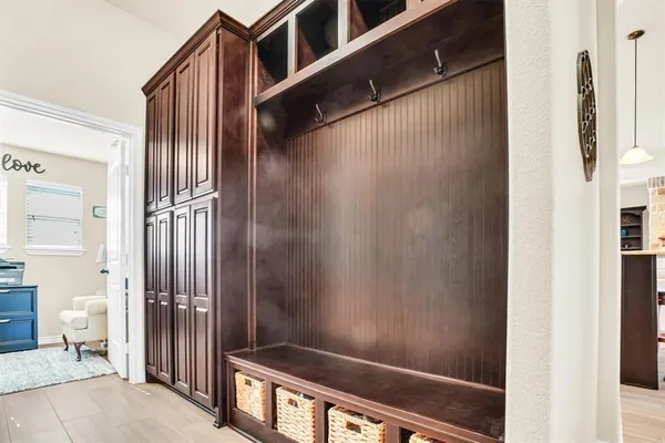 a bathroom with a shower and a sink