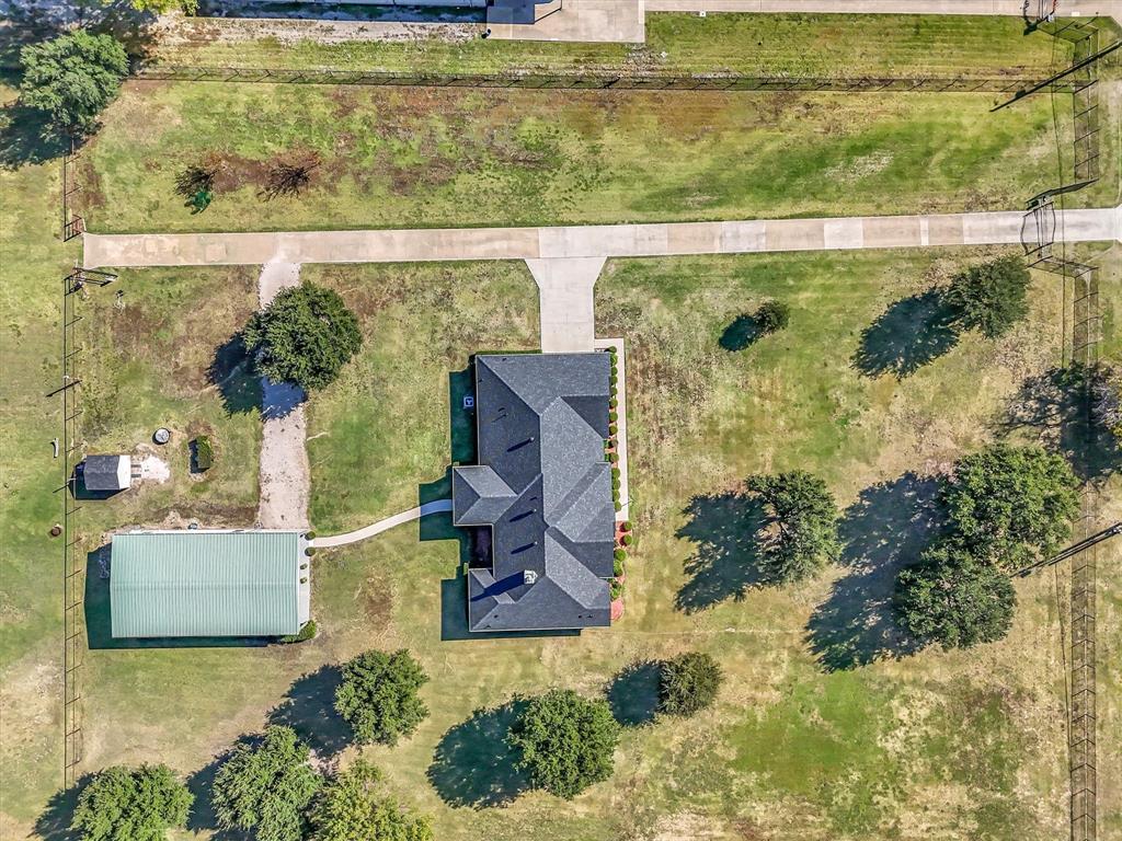 14095 Pecan Lane Forney, TX 75126 - Photo 35 of 40 a view of swimming pool with seating area and green space
