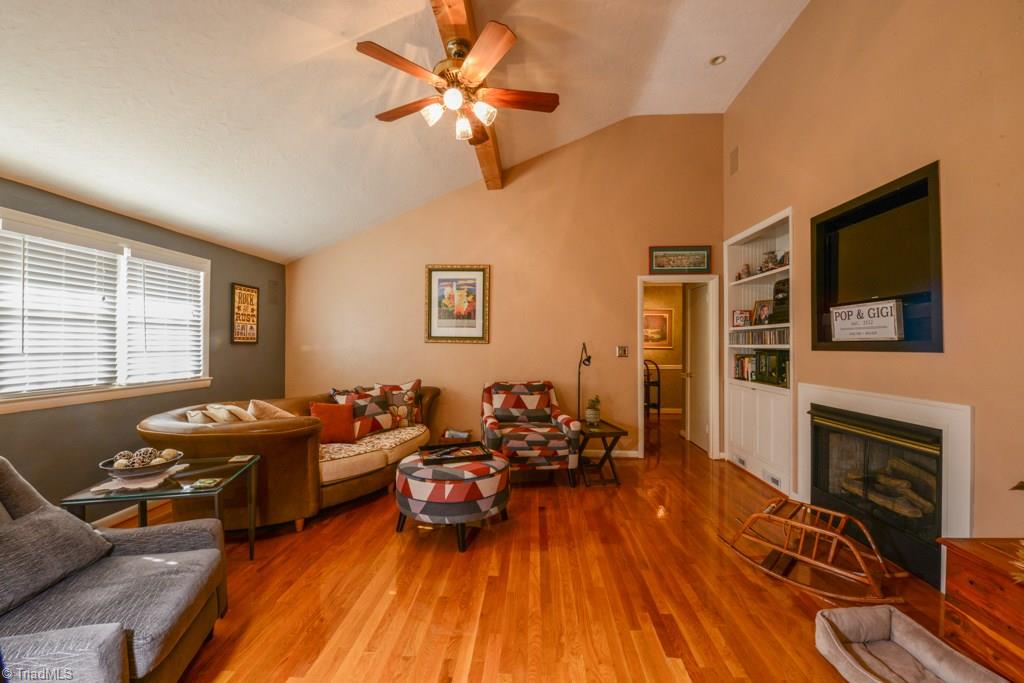 809 Sunset Drive High Point, NC 27262 - Photo 20 of 30 Huge den with vaulted ceiling and fireplace