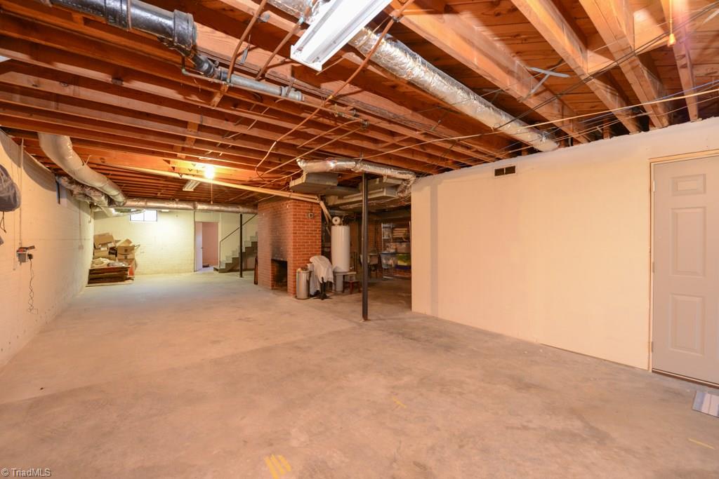 809 Sunset Drive High Point, NC 27262 - Photo 29 of 30 This enormous DRY basement is great for storage or could easily be finished into living space