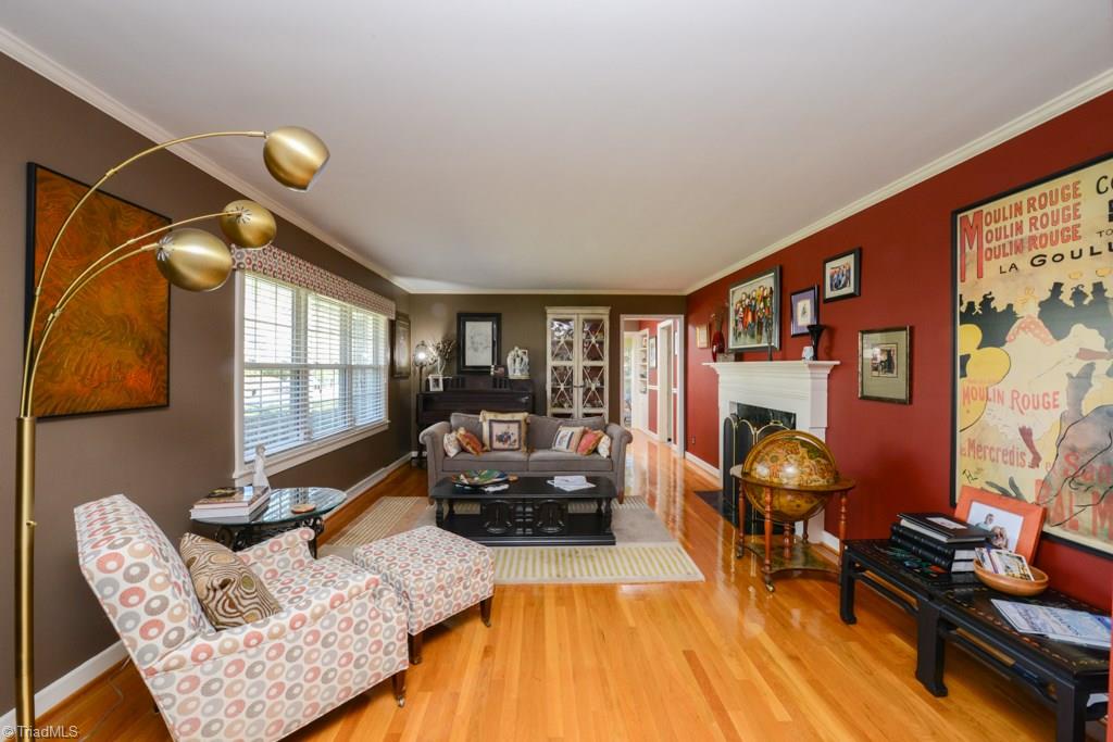 Living room has gas logs.  Polished hardwood floors are in great shape.