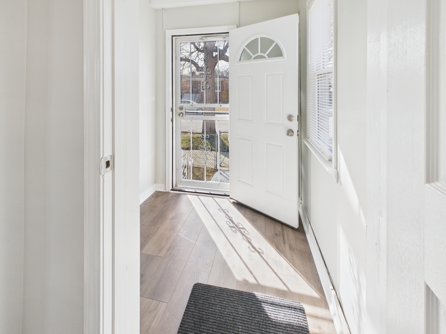 9151 South Normal Avenue Chicago, IL 60620 - Photo 34 of 34 a view of front door with wooden floor