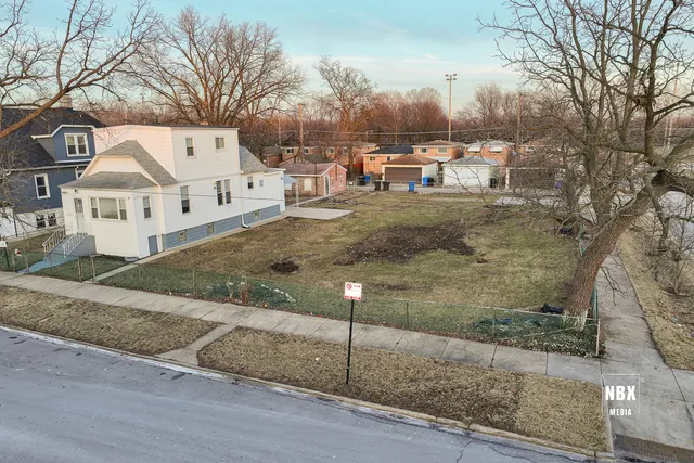 a view of a town with barn house