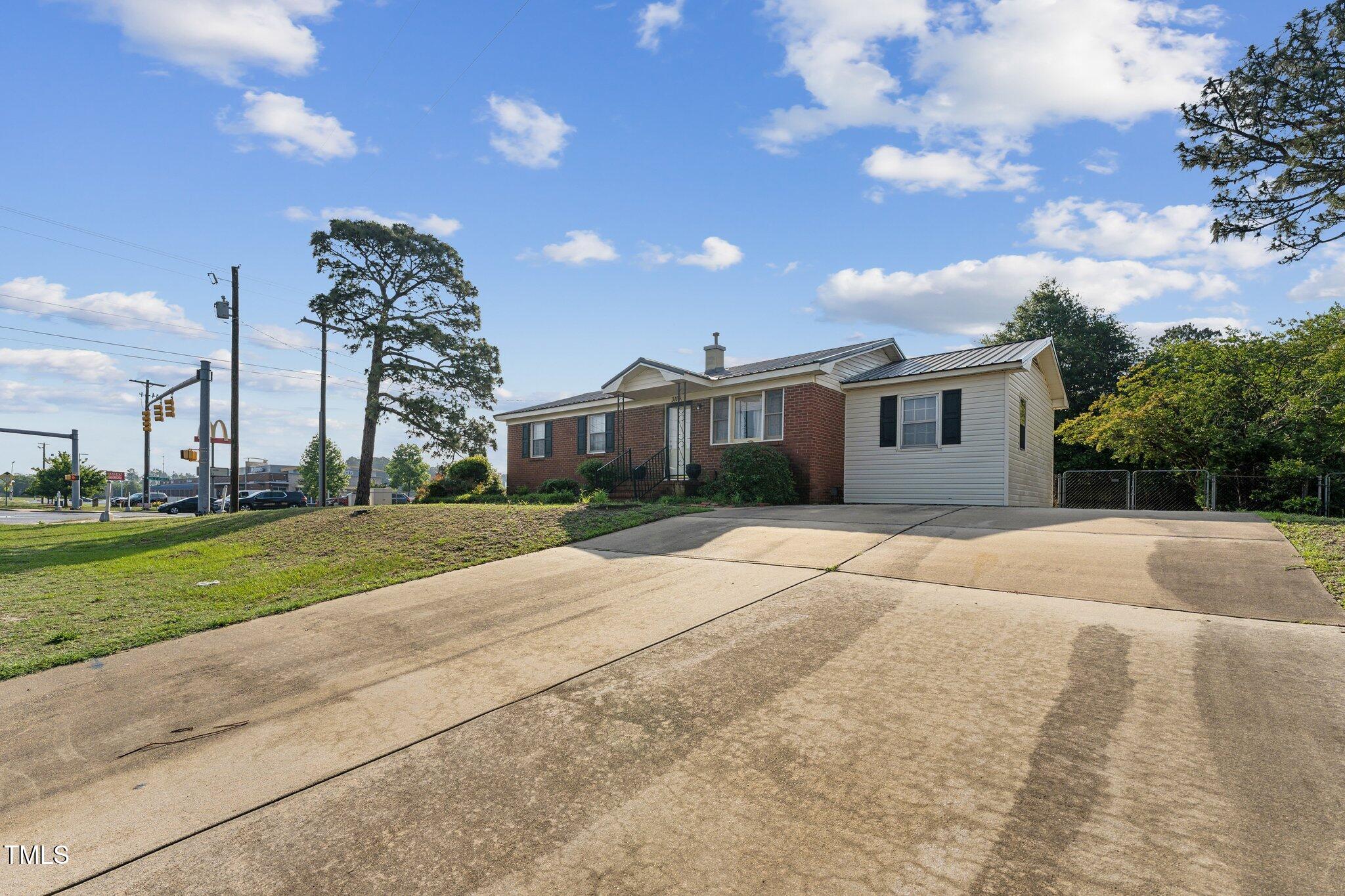 3115 Legion Road Hope Mills, NC 28348 - Photo 23 of 26 a house with outdoor space