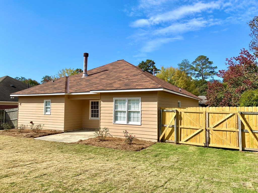 6032 North Pointe Drive Columbus, GA 31909 - Photo 24 of 26 a house view with a garden space