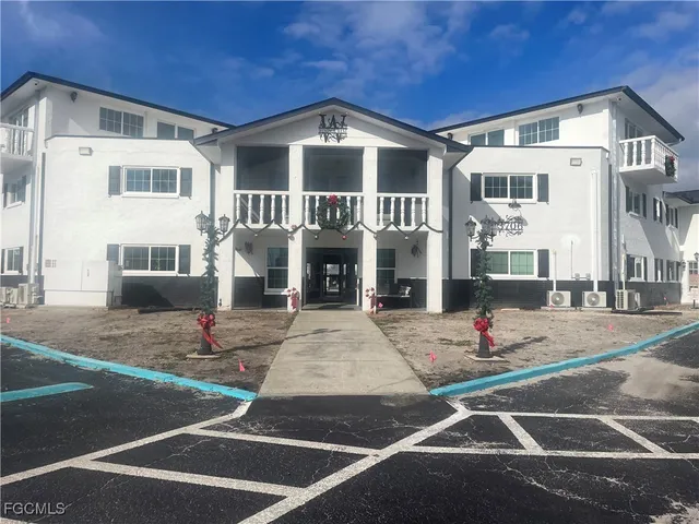a front view of a building with street