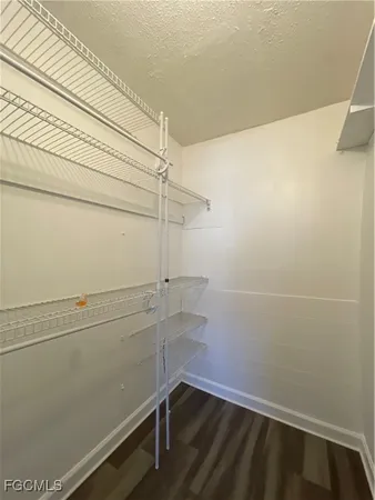 a view of small space with racks on the wall