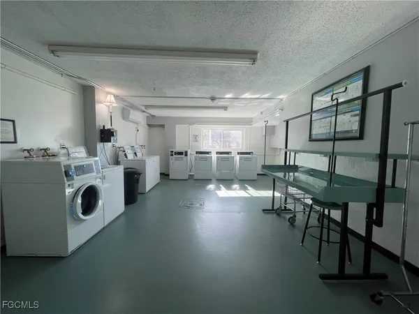 a view of a storage & utility room with washer and dryer