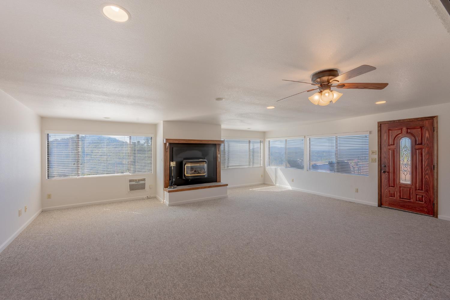 5912 Old Gulch Road San Andreas, CA 95249 - Photo 20 of 71 an empty room with fan and windows