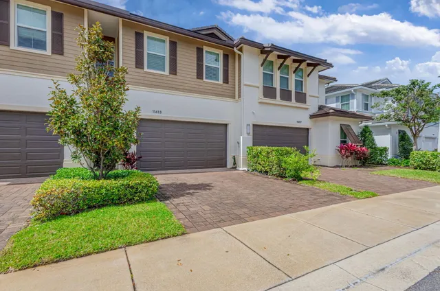 a swimming pool with outdoor seating and yard