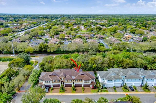 a view of room with window and ceiling fan