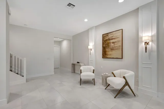 a utility room with sink dryer and washer