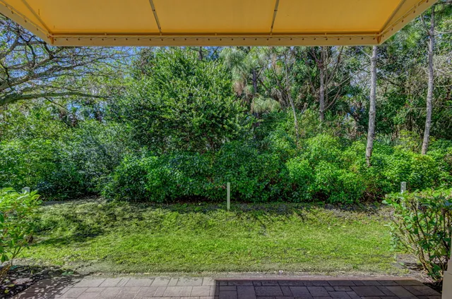a bedroom with a bed and a chair
