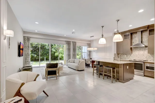 a kitchen with a stove and a sink