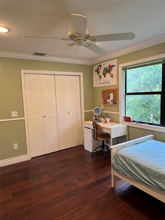 22251 Sands Point Drive Boca Raton, FL 33433 - Photo 13 of 41 a living room with furniture a table and wooden floor