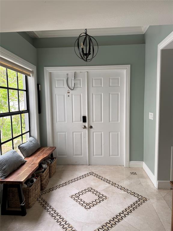 22251 Sands Point Drive Boca Raton, FL 33433 - Photo 25 of 41 a view of a livingroom with furniture and window