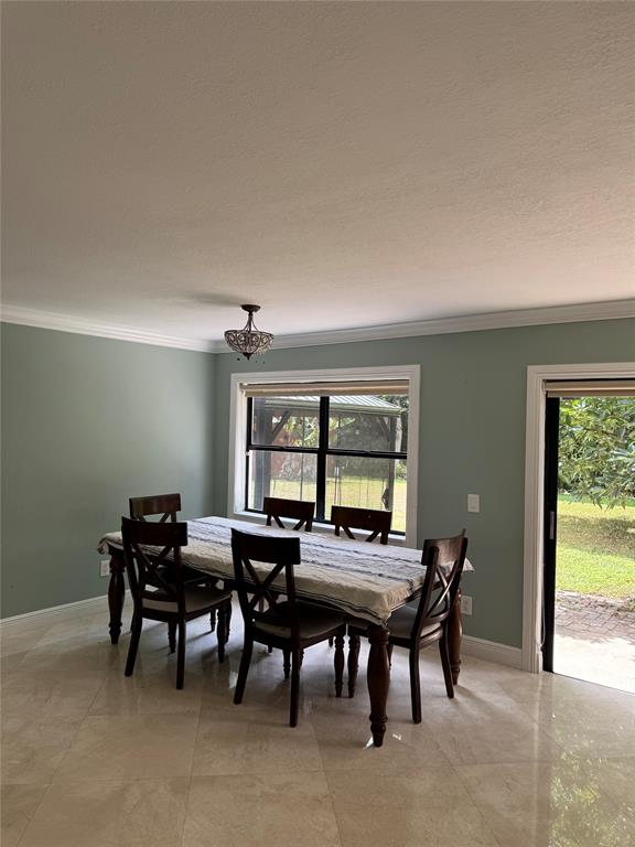 22251 Sands Point Drive Boca Raton, FL 33433 - Photo 29 of 41 a view of a livingroom and dining room