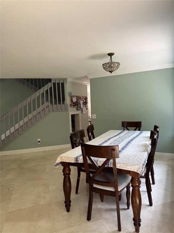 22251 Sands Point Drive Boca Raton, FL 33433 - Photo 30 of 41 a view of a dining room with furniture and wooden floor