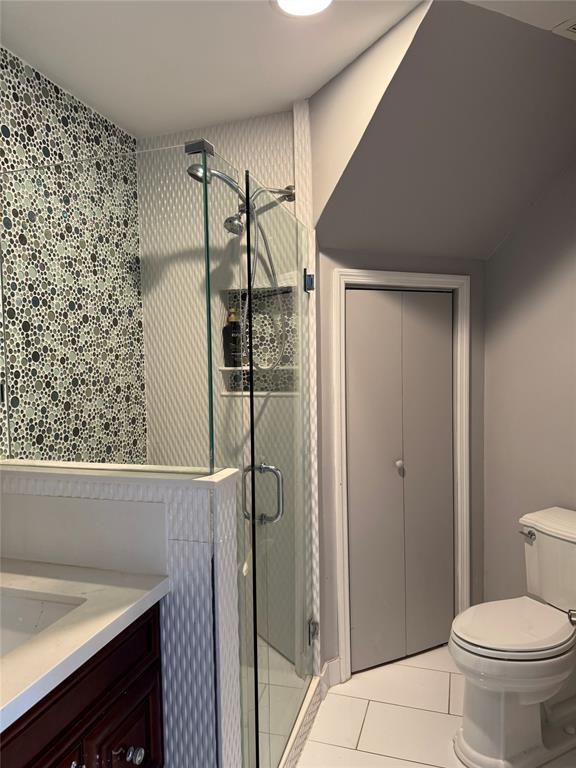 22251 Sands Point Drive Boca Raton, FL 33433 - Photo 37 of 41 a bathroom with a toilet and a shower