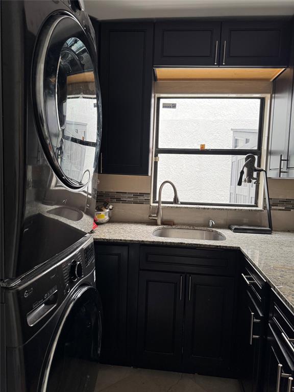 22251 Sands Point Drive Boca Raton, FL 33433 - Photo 41 of 41 a bathroom with a granite countertop sink a mirror and a window