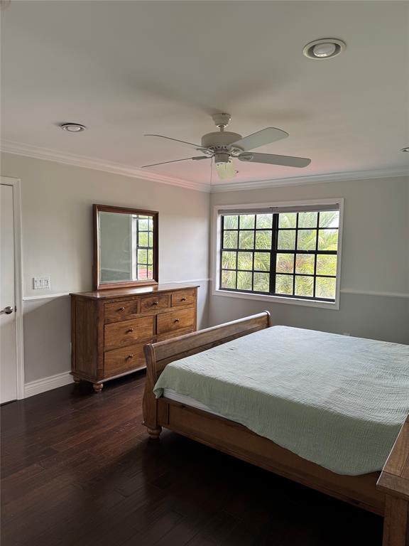 22251 Sands Point Drive Boca Raton, FL 33433 - Photo 5 of 41 a bedroom with a large bed and windows