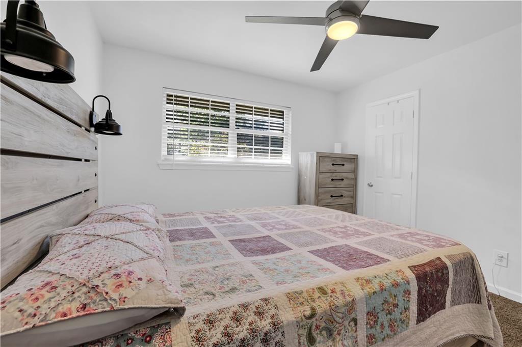 3133 Buford Highway Northeast, Unit 3 Brookhaven, GA 30329 - Photo 16 of 36 a bedroom with a bed and a window