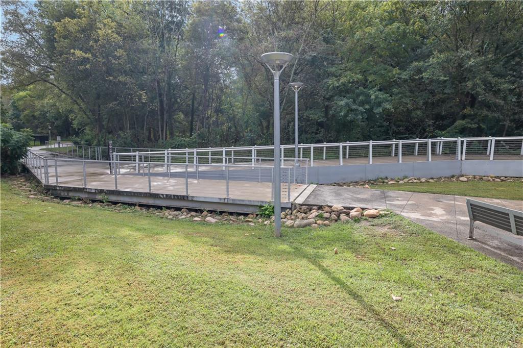 3133 Buford Highway Northeast, Unit 3 Brookhaven, GA 30329 - Photo 29 of 36 a view of a swimming pool with a yard