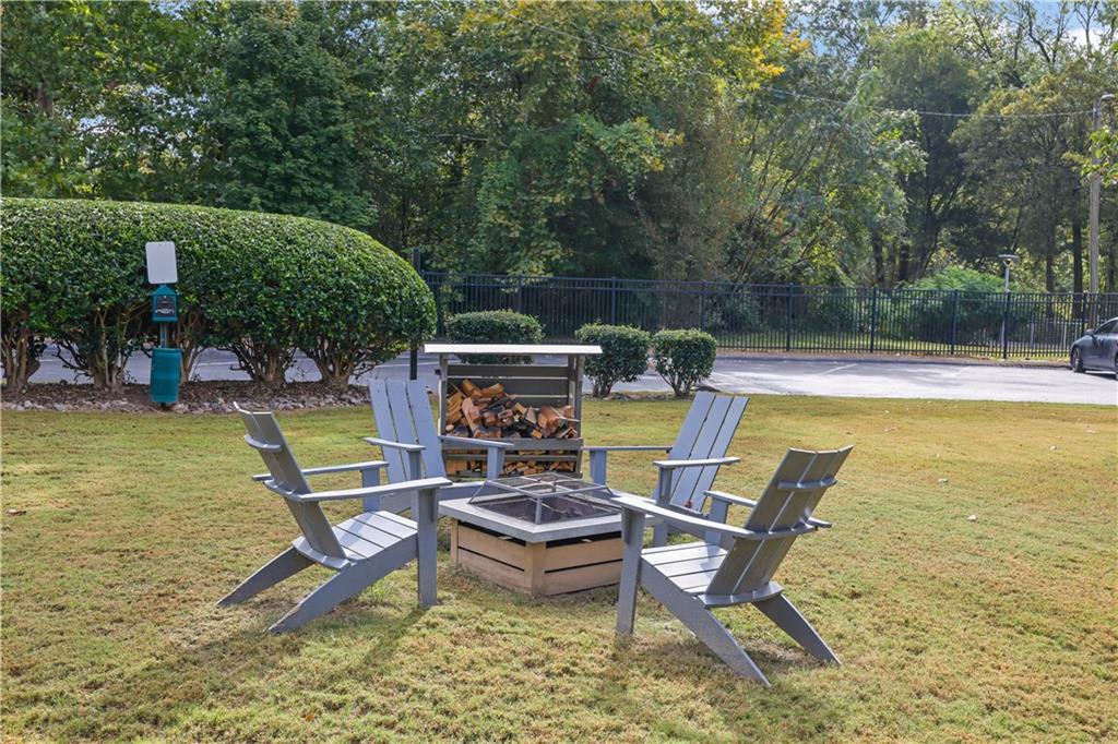 3133 Buford Highway Northeast, Unit 3 Brookhaven, GA 30329 - Photo 30 of 36 a view of swimming pool with chairs
