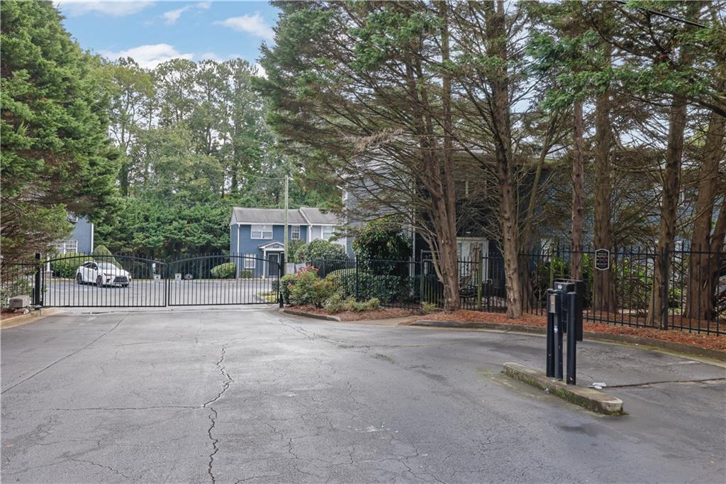 3133 Buford Highway Northeast, Unit 3 Brookhaven, GA 30329 - Photo 34 of 36 a view of a road with trees in front of it