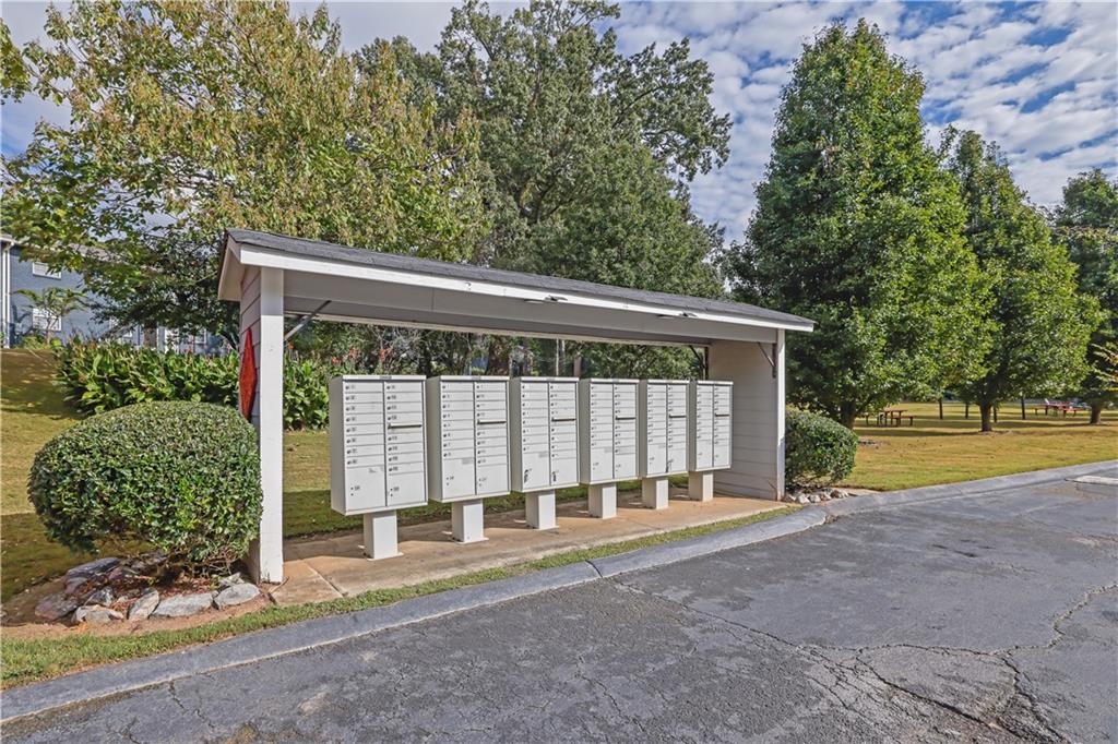 3133 Buford Highway Northeast, Unit 3 Brookhaven, GA 30329 - Photo 35 of 36 a view of backyard with large tree and wooden fence