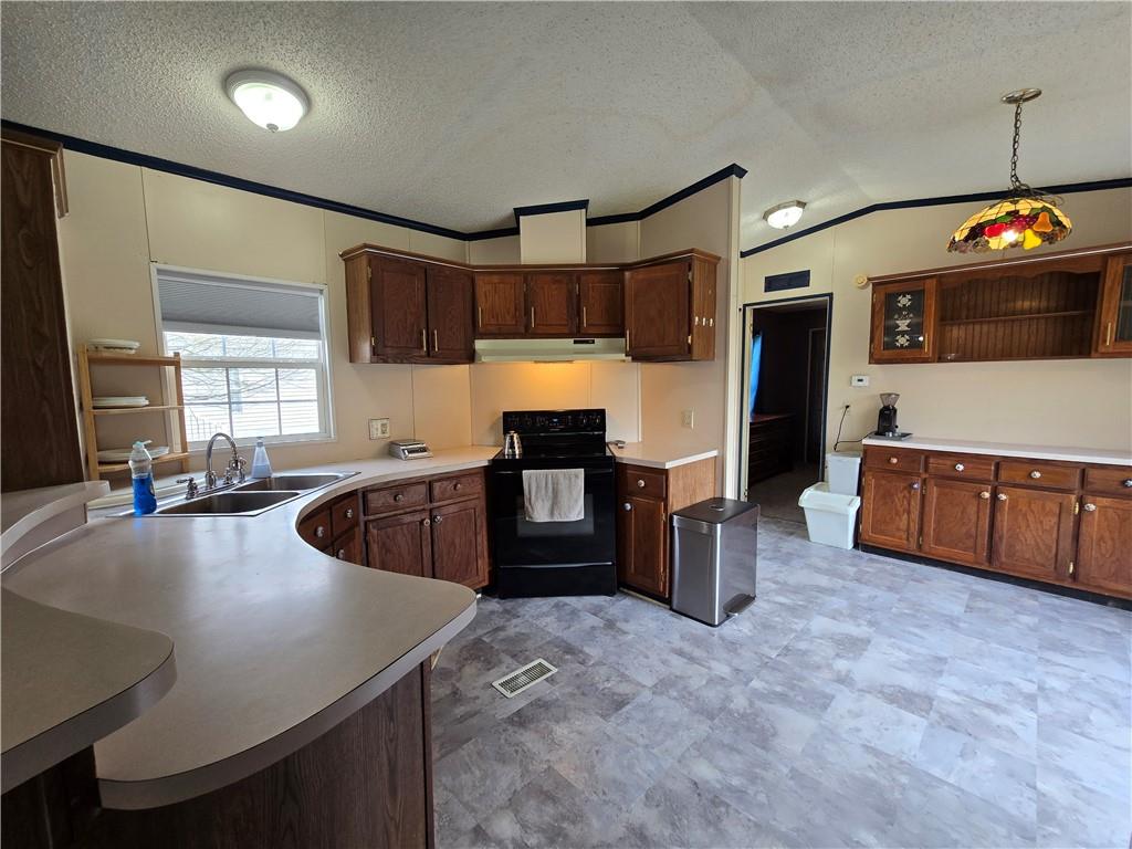 540 Finks Run Road McDonald, PA 15057 - Photo 12 of 39 a kitchen with stainless steel appliances granite countertop a sink a stove and a refrigerator